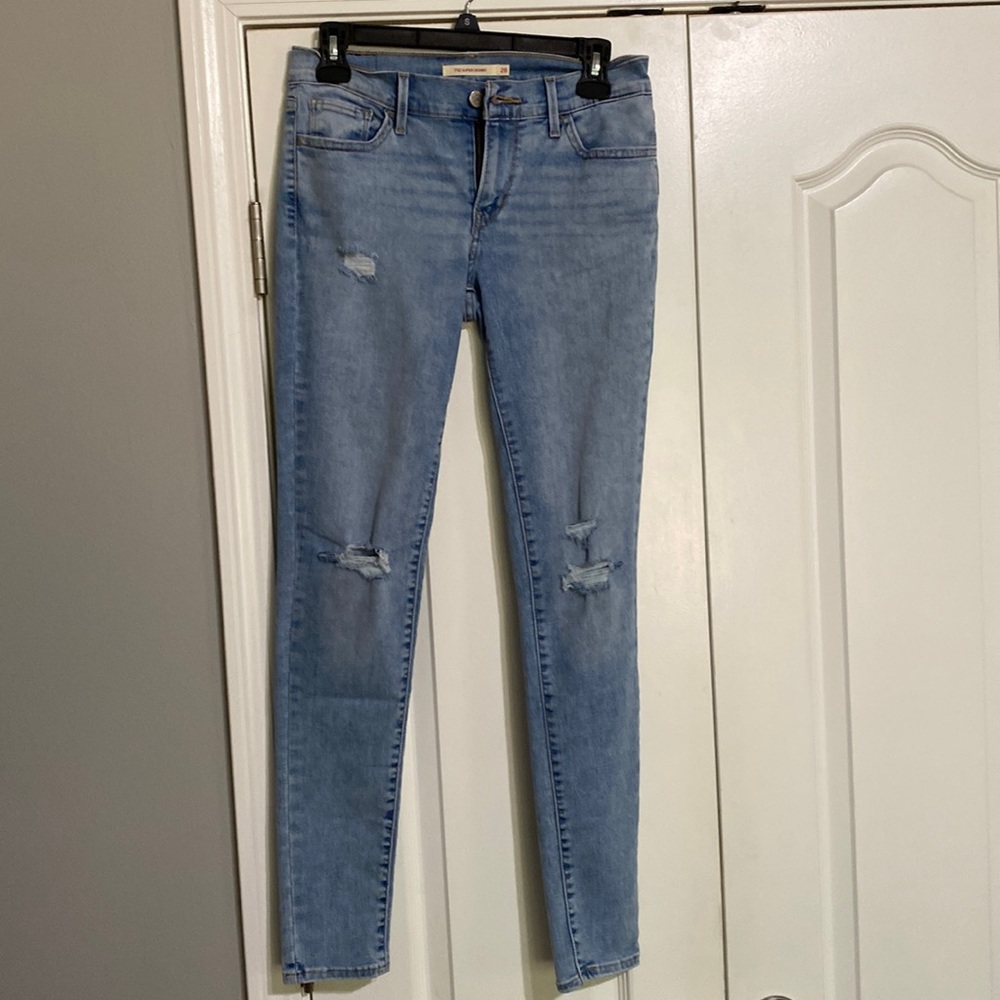 Levi 710 super skinny size 28 ripped jeans